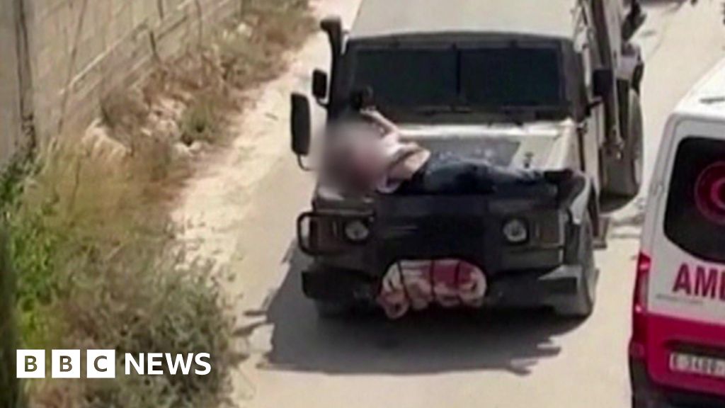 Israeli army strapped wounded Palestinian to jeep: video