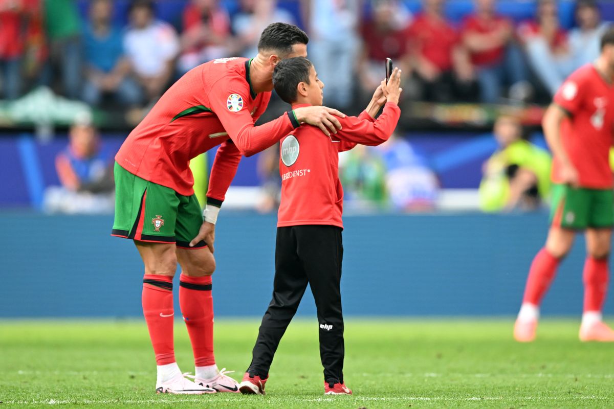 Cristiano Ronaldo Poses for Selfie with Young Fan After Portugal's Euro 2024 Win