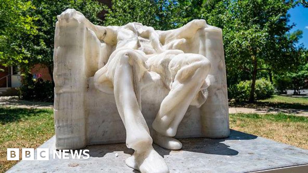 DC Heat Melts Lincoln Wax Figure's Head